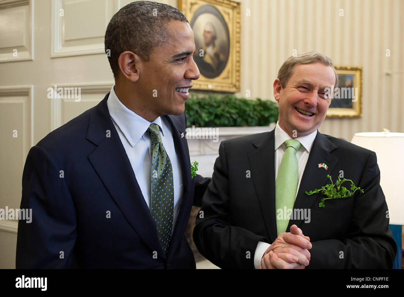 President Barack Obama greets Taoiseach Enda Kenny of Ireland during a meeting in the Oval Office, March 20, 2012 in Washington, DC. Stock Photo