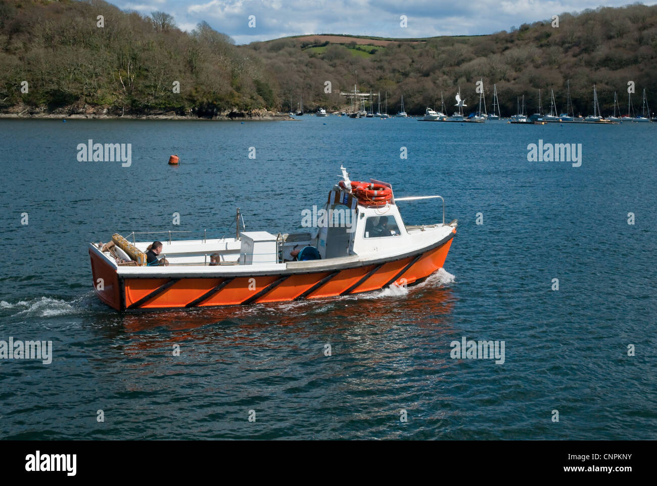 Small passenger water taxi on the river. Stock Photo