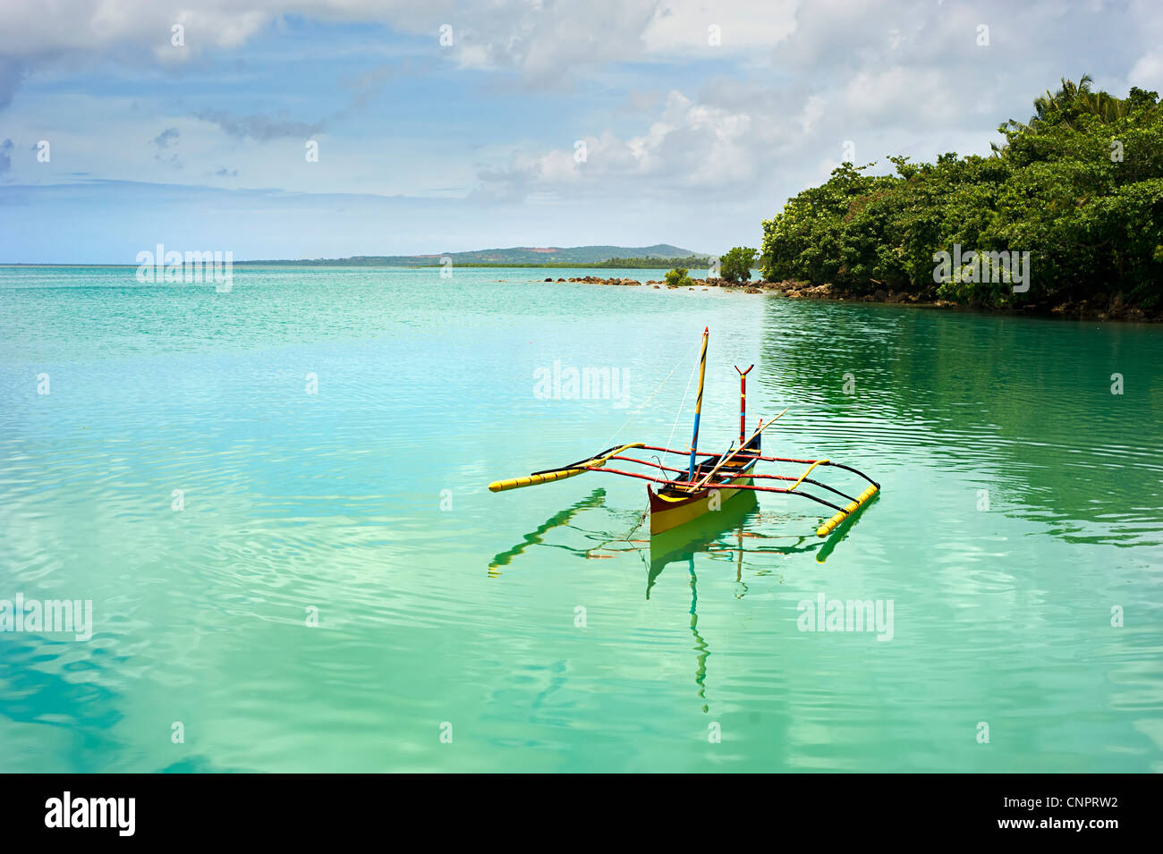 Tropical landscape with traditional Philippines boat on Calicoan island, Philippines Stock Photo