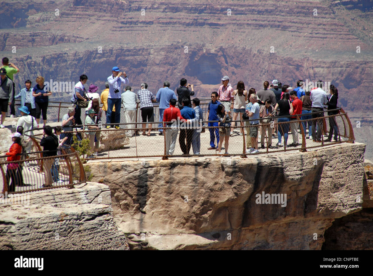 Tourists at one of the view points on the Grand Canyon, South Rim Stock Photo