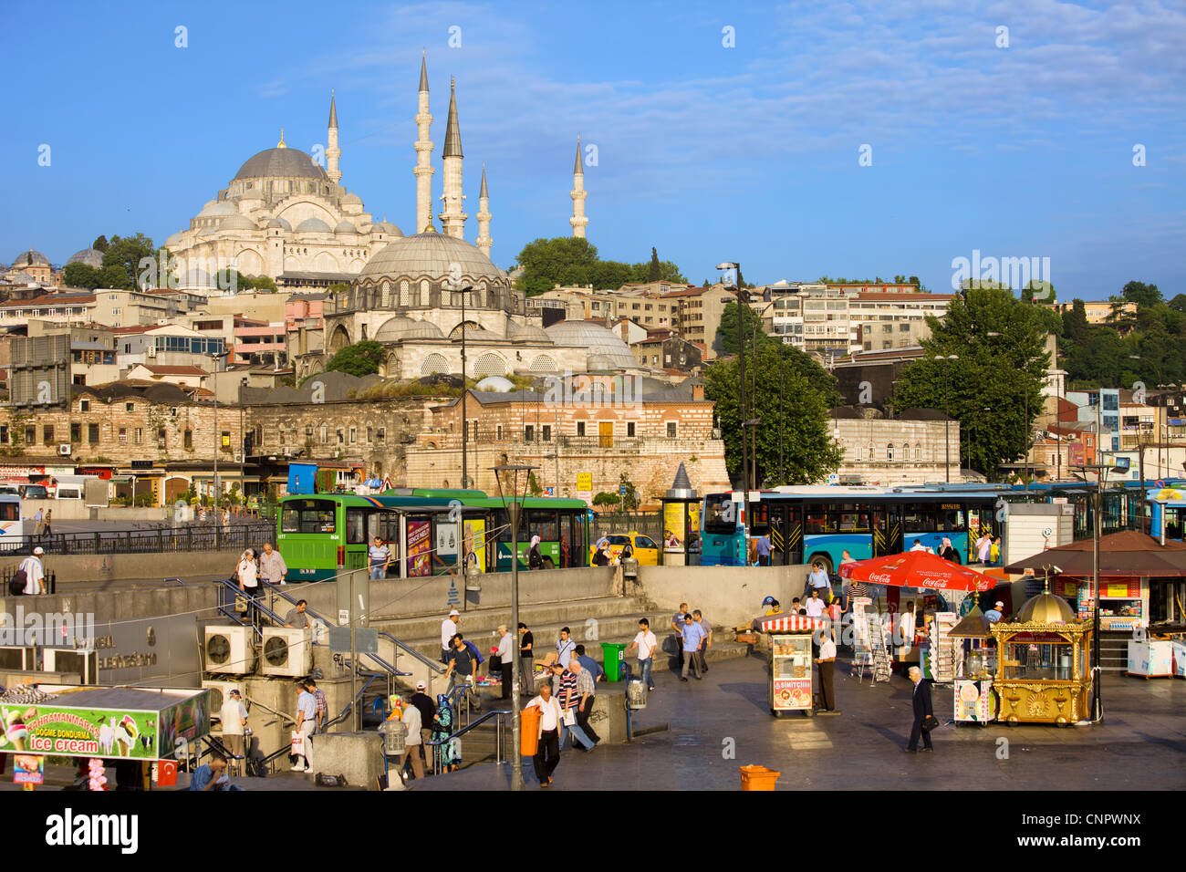 City life in historic district of Istanbul with Suleymaniye Mosque at the far end in Turkey. Stock Photo