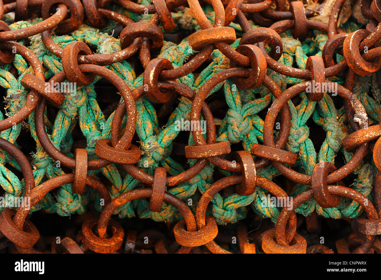 Chain links and ropes on scallop dredger boat fishing nets Stock Photo