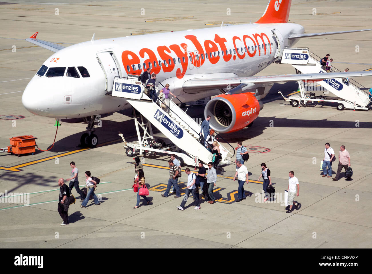 Passengers boarding an Easyjet plane, Stansted airport Essex UK Stock Photo