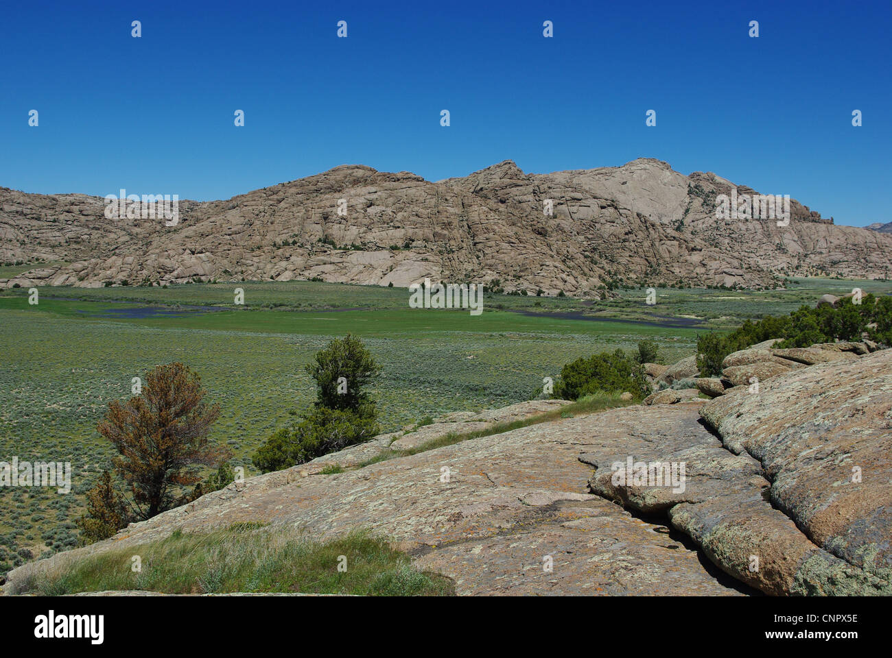 Beautiful rocks and green river valley, Split Rock, Wyoming Stock Photo