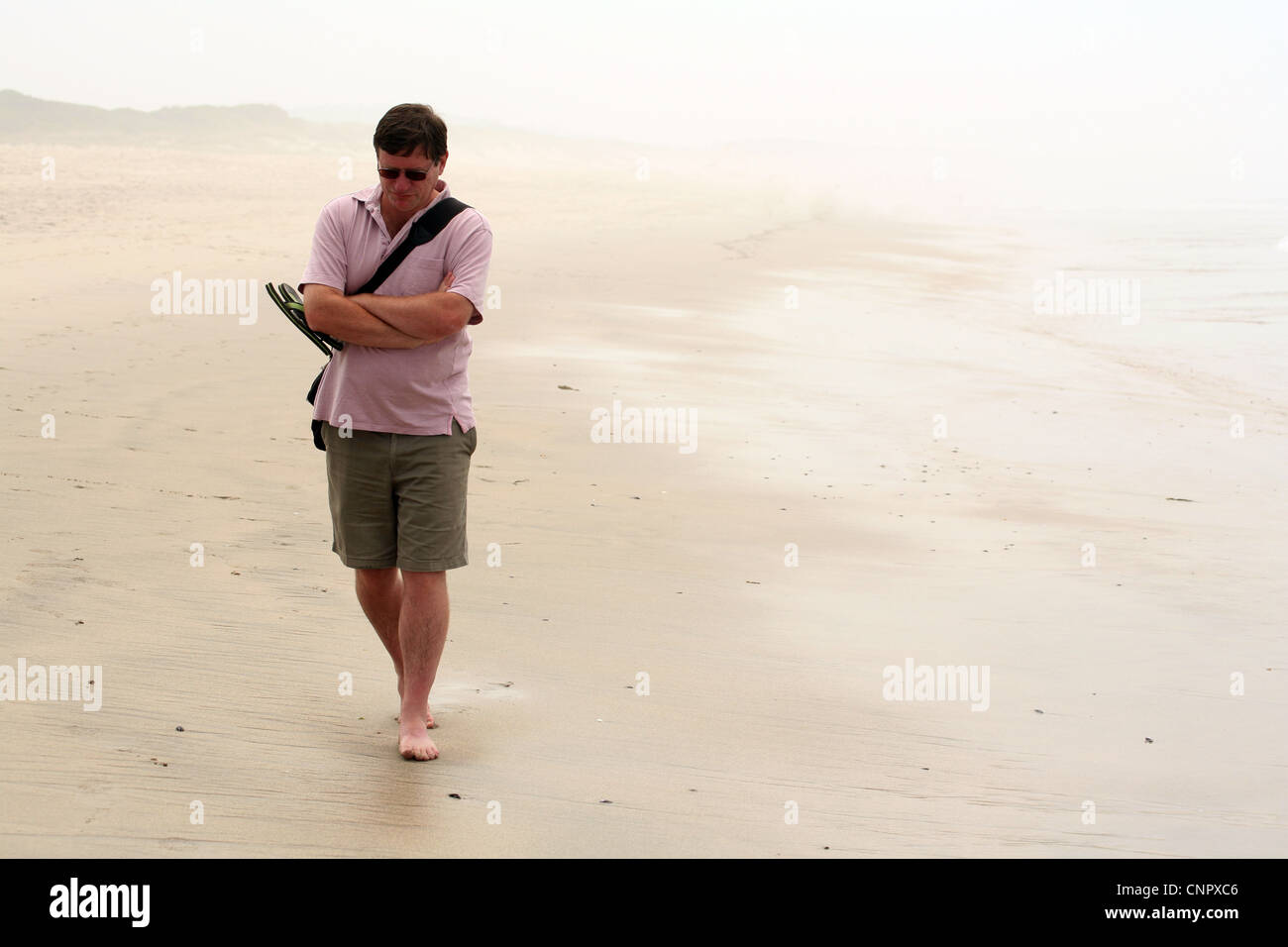 Sad lonely aged man walking hi-res stock photography and images - Alamy