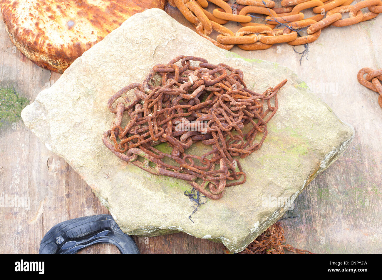 Rusty chains in a harbor in Falmouth Cornwall. Stock Photo