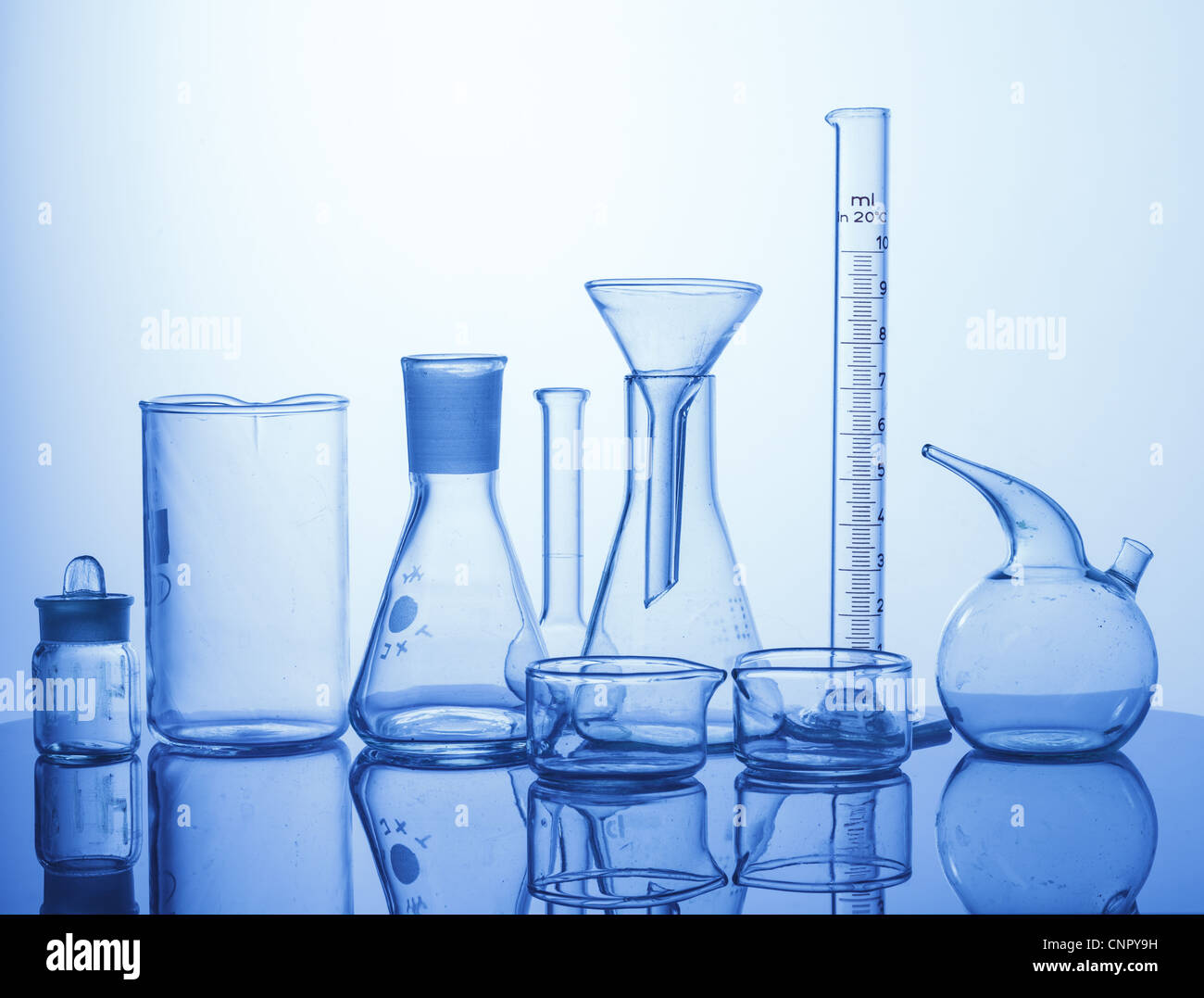 Research Lab assorted Glassware Equipment on blue background Stock ...
