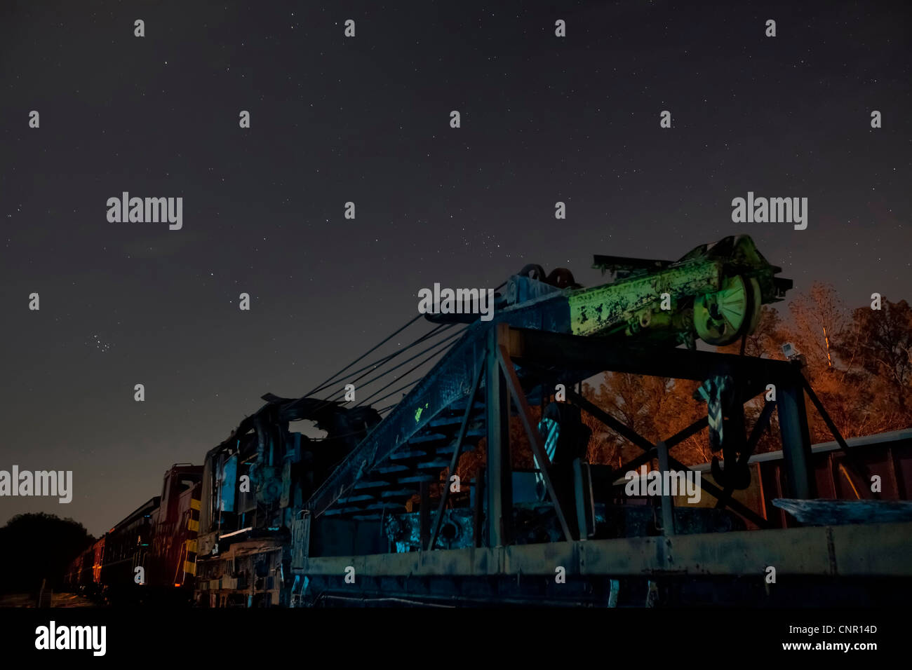 Old Train Railway Crane at night, Texas State Railroad, 1881, Rusk Texas Stock Photo