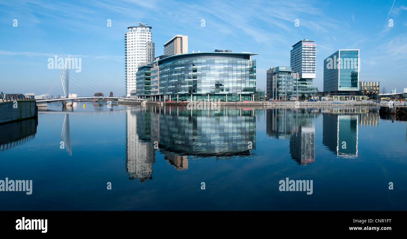 The MediaCityUK complex over the Manchester Ship Canal at Salford Quays, Manchester, England, UK Stock Photo