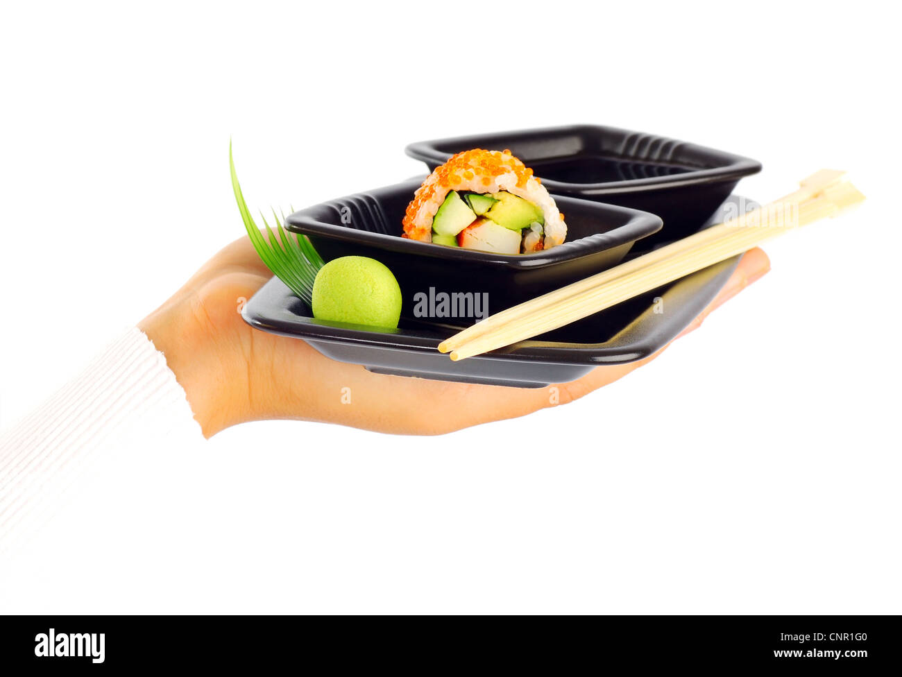 Waiter's hand isolated on white background with a tray of designed Japanese roll Stock Photo