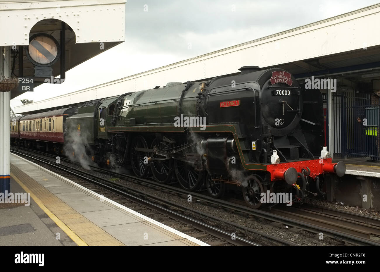 Steam Locomotive 'Britannia' heads The Cathedrals Express at Staines -1 Stock Photo