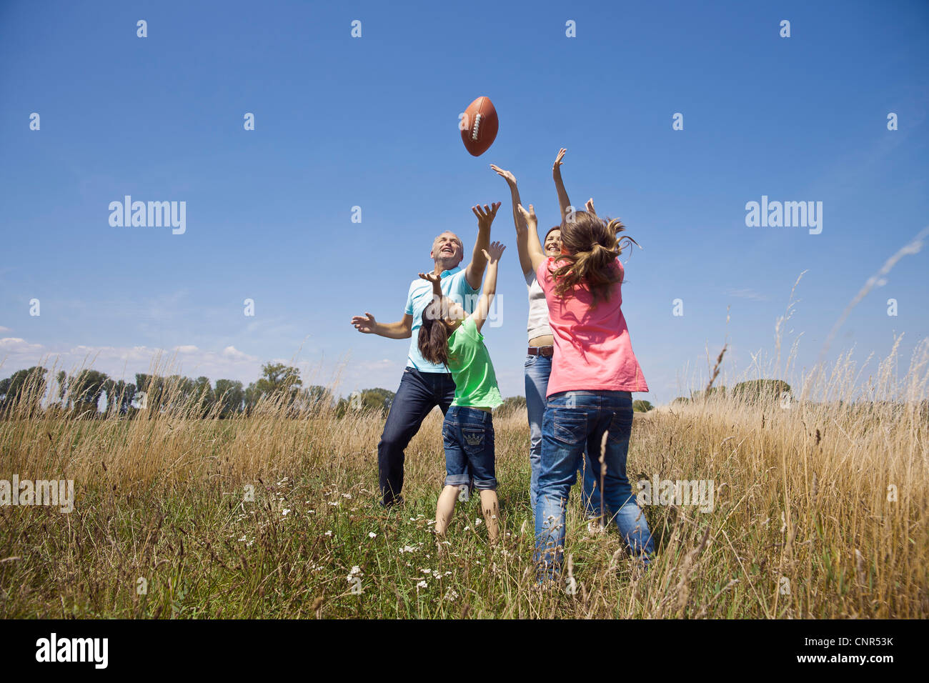 Family Playing Football, Mannheim, Baden-Wurttemberg, Germany Stock
