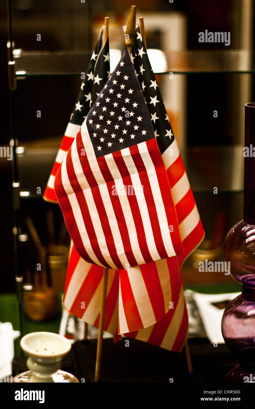 Store window display of several American Flags Stock Photo