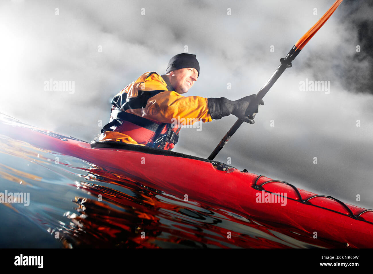 Kayaker paddling in water Stock Photo Alamy