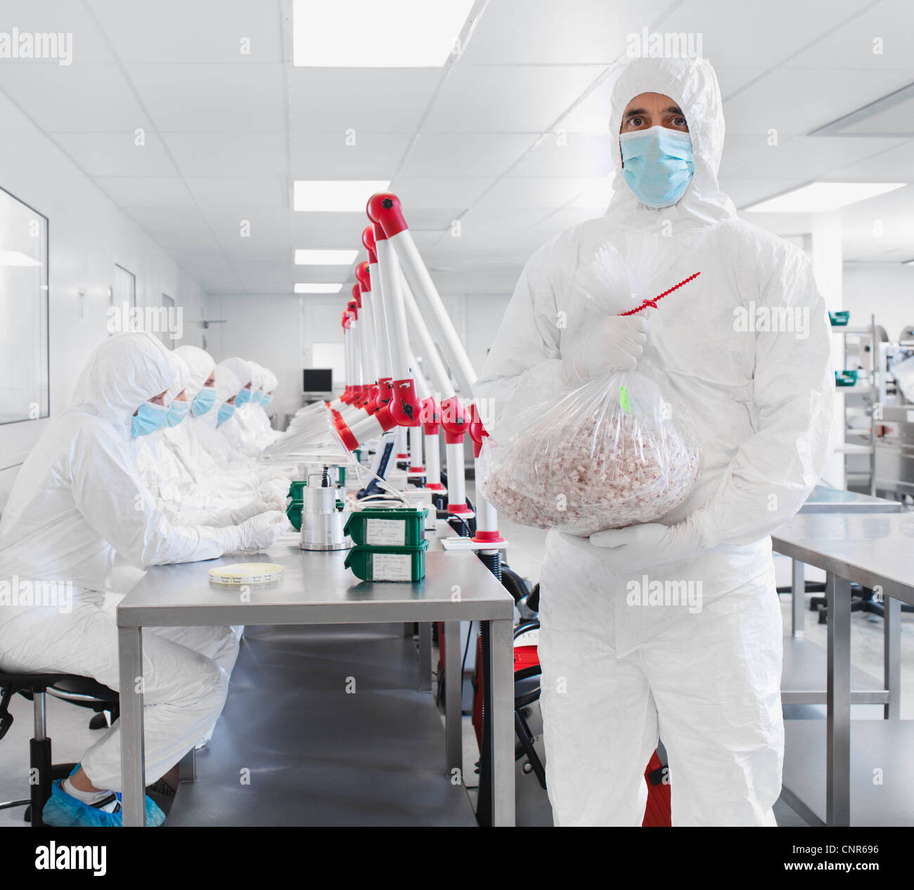 Scientists working in lab Stock Photo