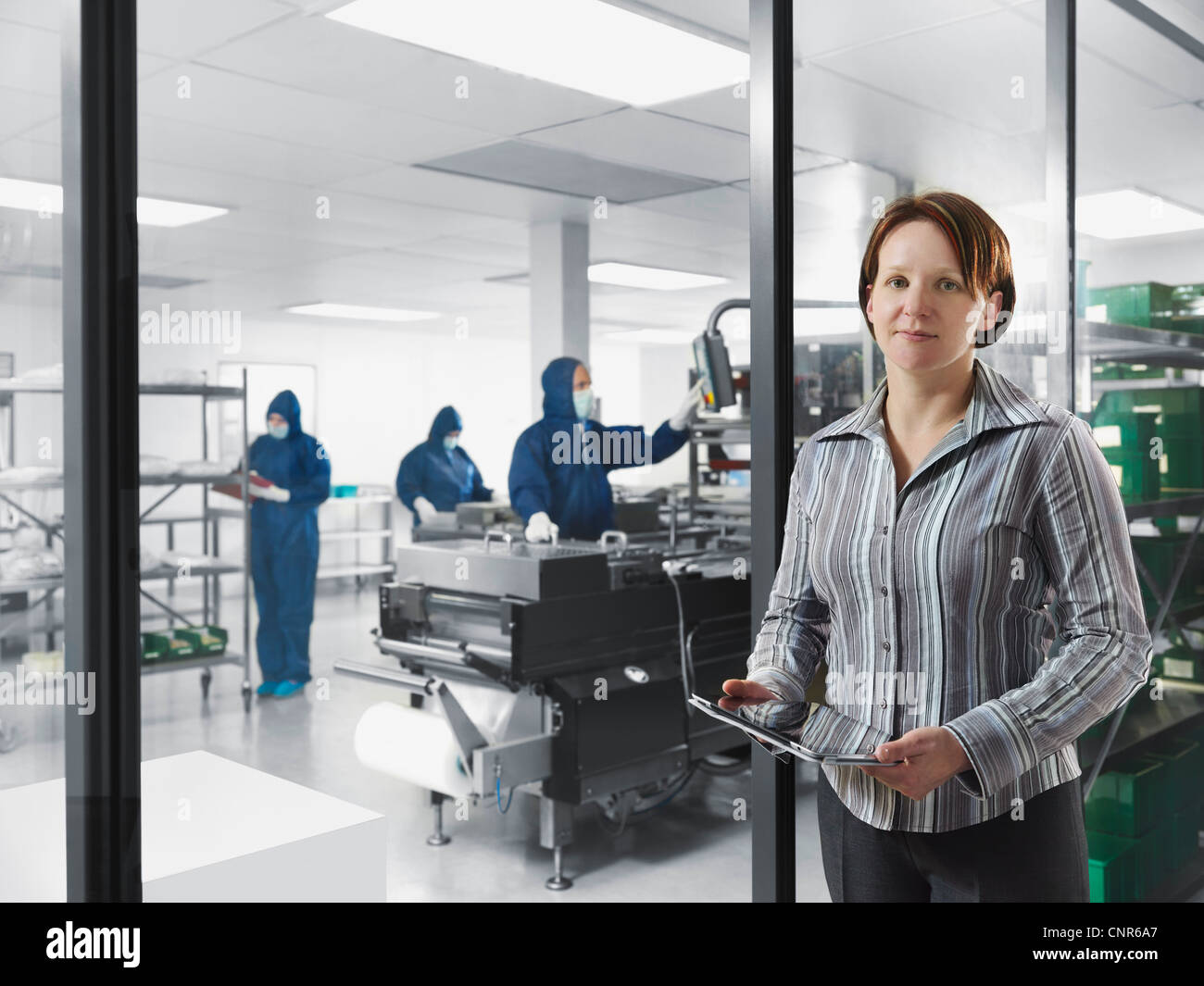 Scientist using laptop computer in lab Stock Photo