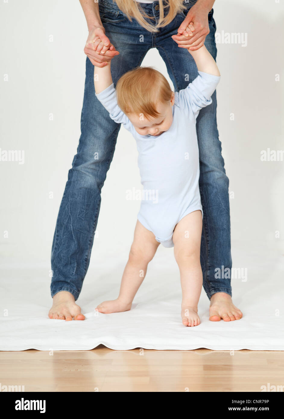 baby learning to run Stock Photo Alamy