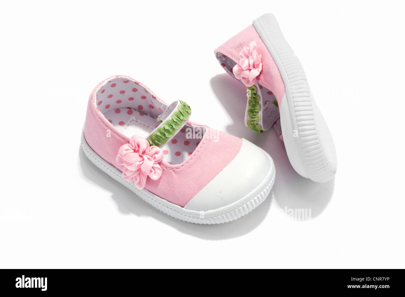 A pair of pink baby shoes Stock Photo - Alamy