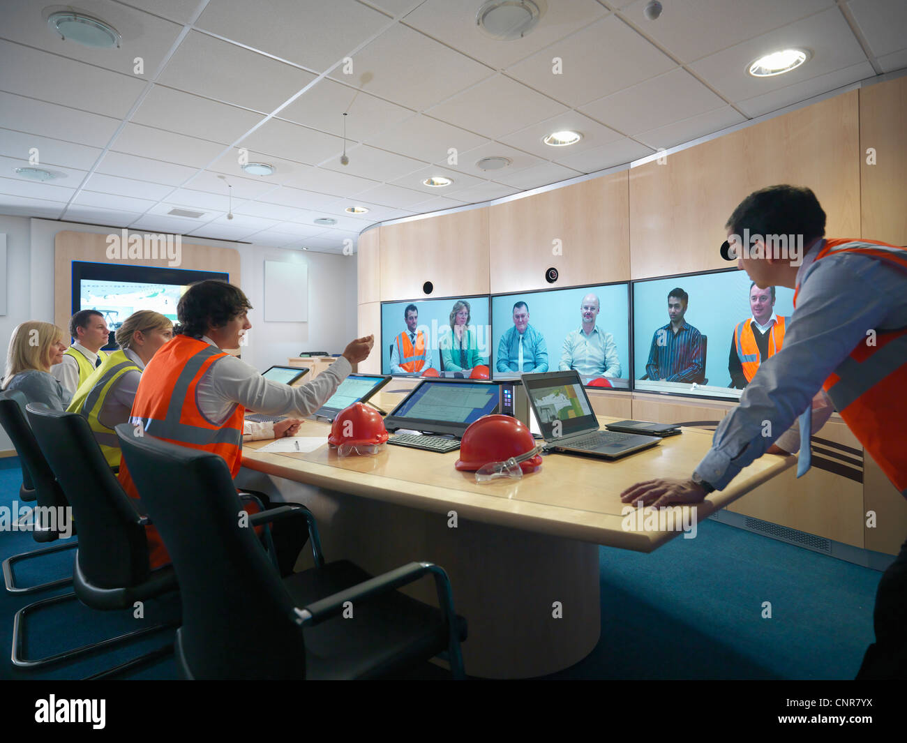 Construction workers in video conference Stock Photo Alamy