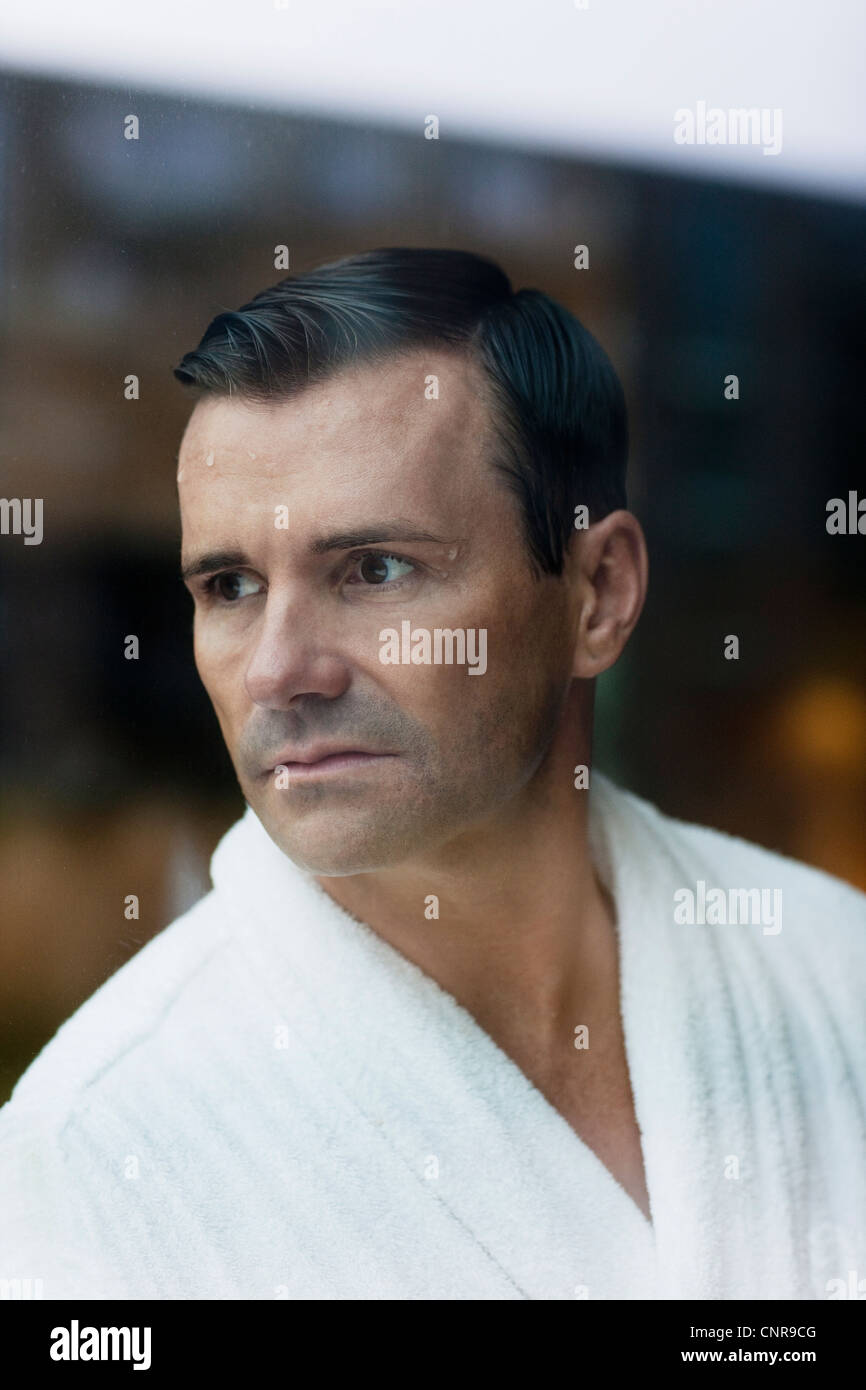 man wearing bathrobe