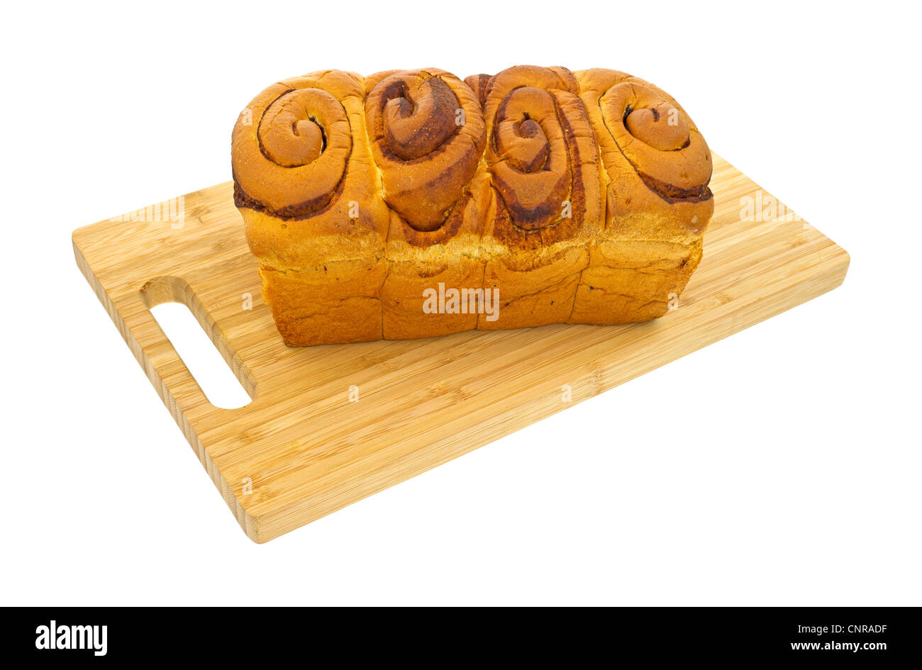 Cinnamon bread loaf on cutting board Stock Photo