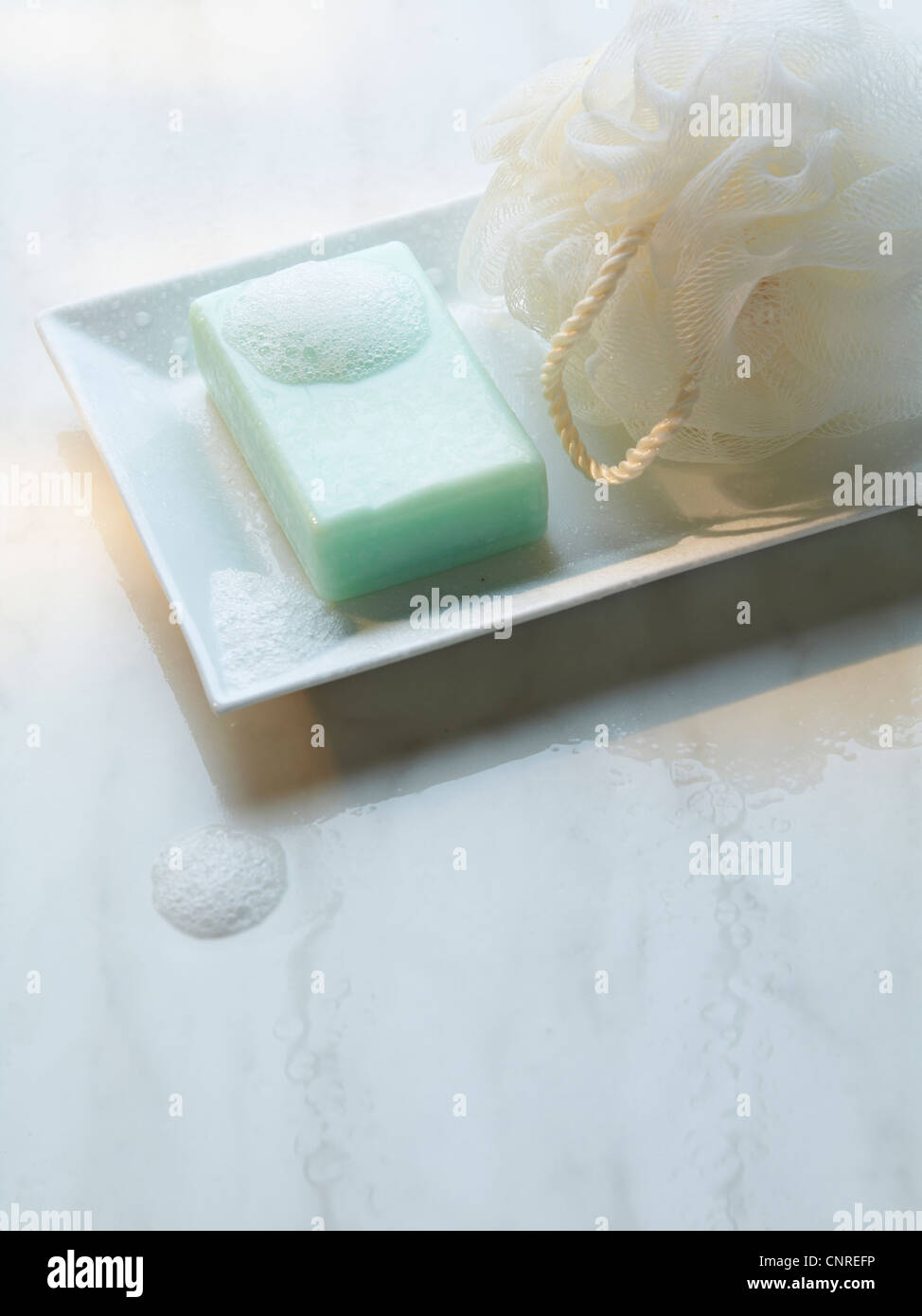Close up of soap and loofah Stock Photo - Alamy