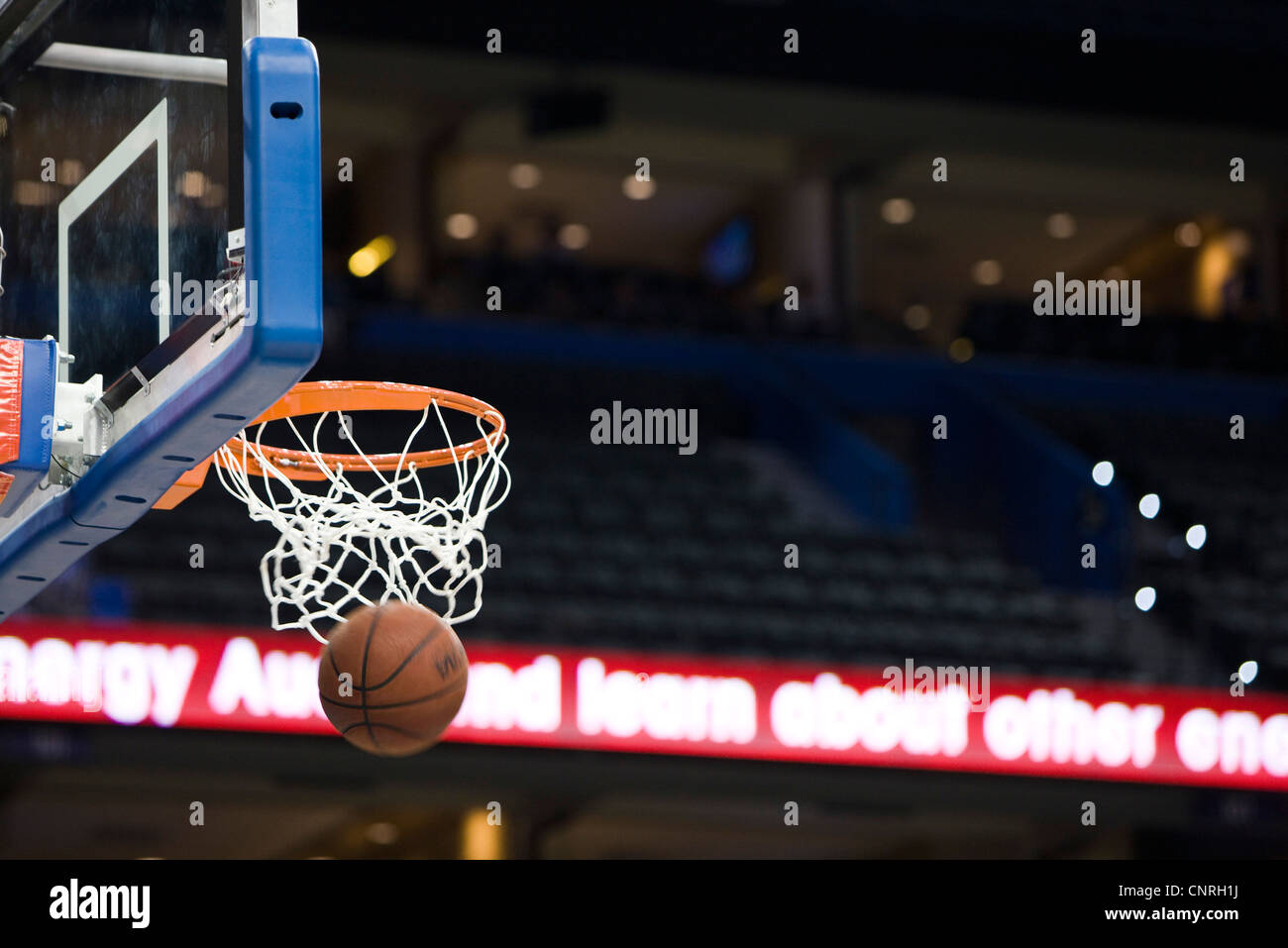 Basketball in hoop, blurred motion Stock Photo Alamy