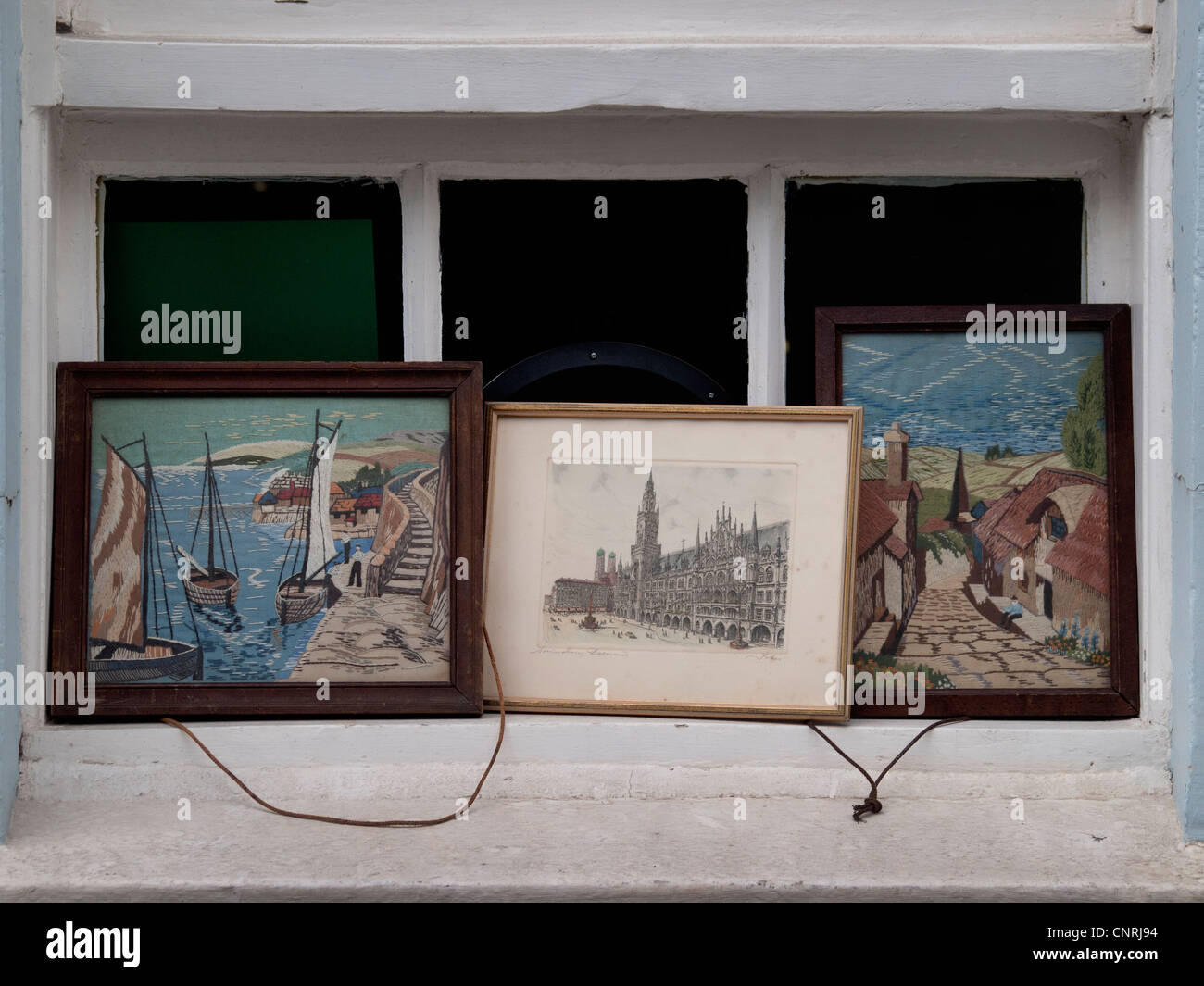 Pictures for sale in a street market Stock Photo Alamy