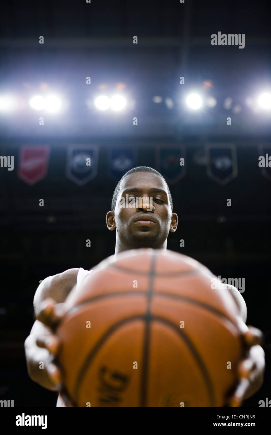 Basketball Player Holding Basketball Stock Photo Alamy