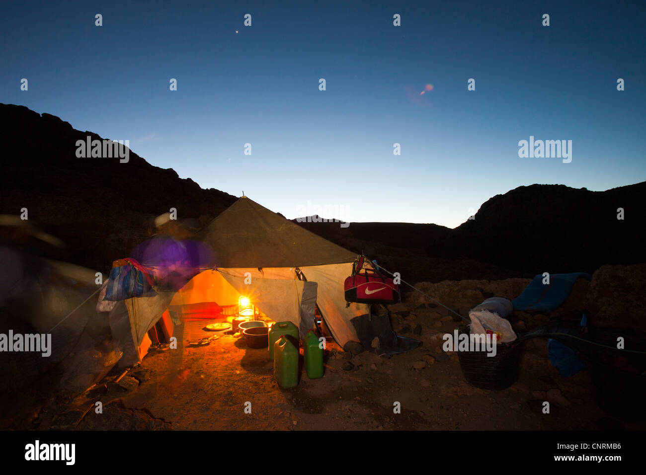 A night time camp on a trek in the Jebel Sirwa region of the Anti Atlas mountains of Morocco, North Africa. Stock Photo