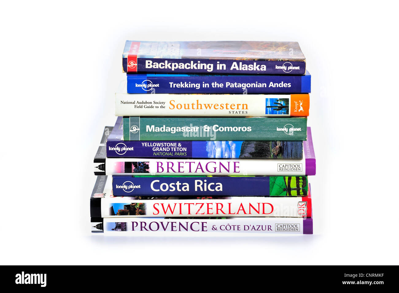 Collection showing assortment of travel guides and guidebooks about worldwide holiday destinations Stock Photo