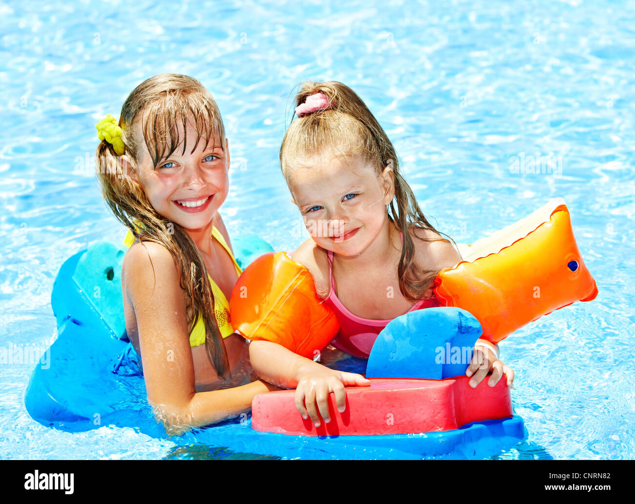 Children with armbands in swimming pool Stock Photo Alamy