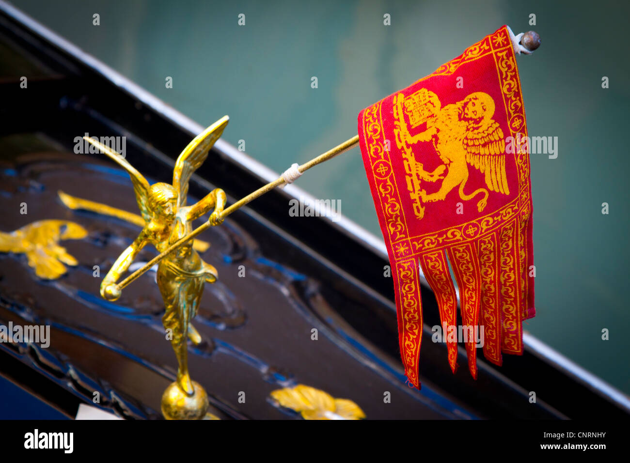 Detail in a gondola. Flag with the lion of St Mark. Venice, Italy. Stock Photo
