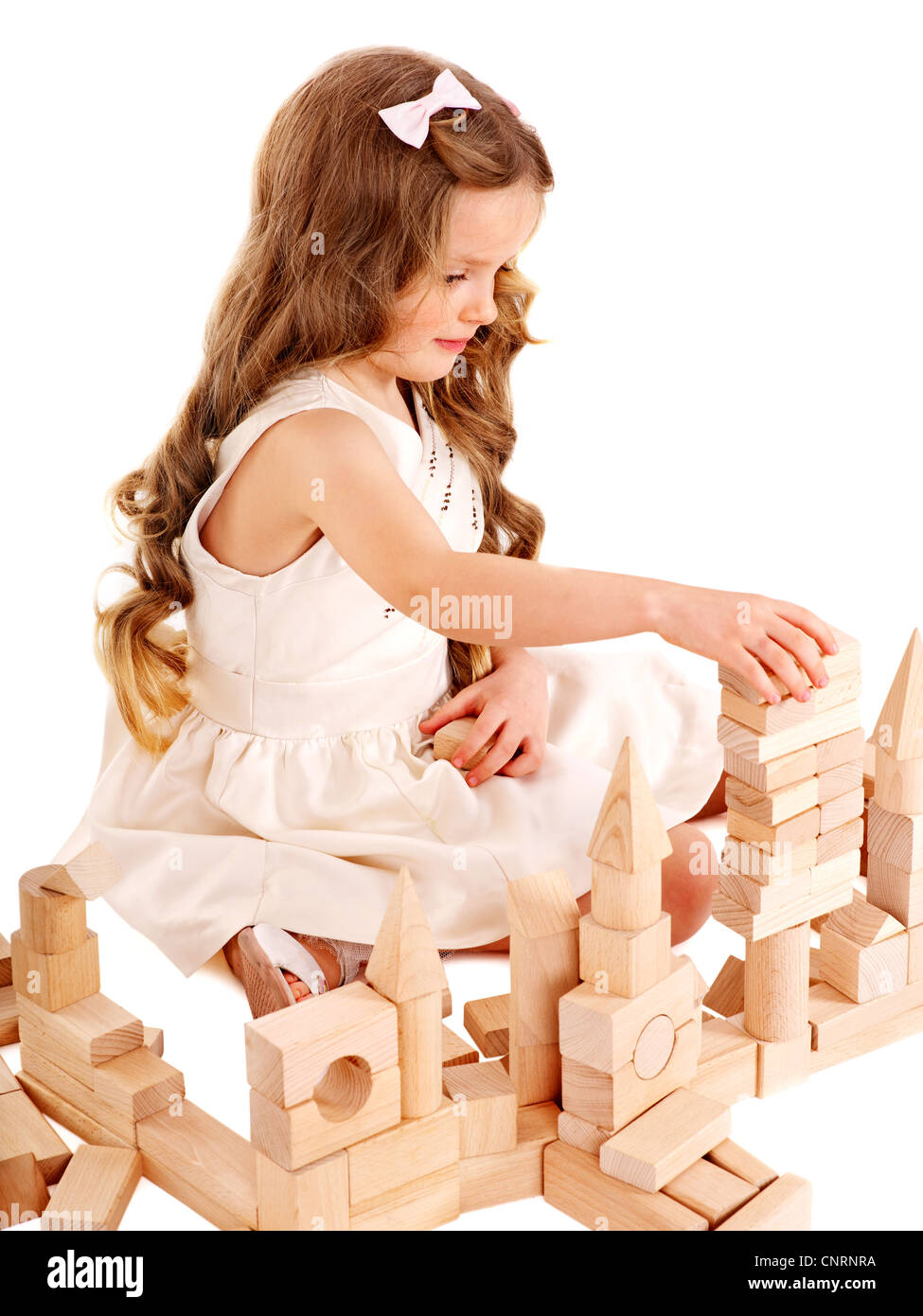 Happy child playing building blocks. Isolated Stock Photo - Alamy