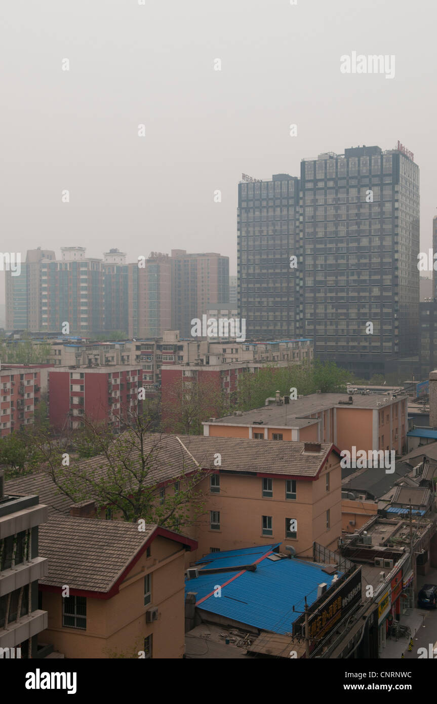 smoggy day in Beijing with sky scrapers in distance Stock Photo