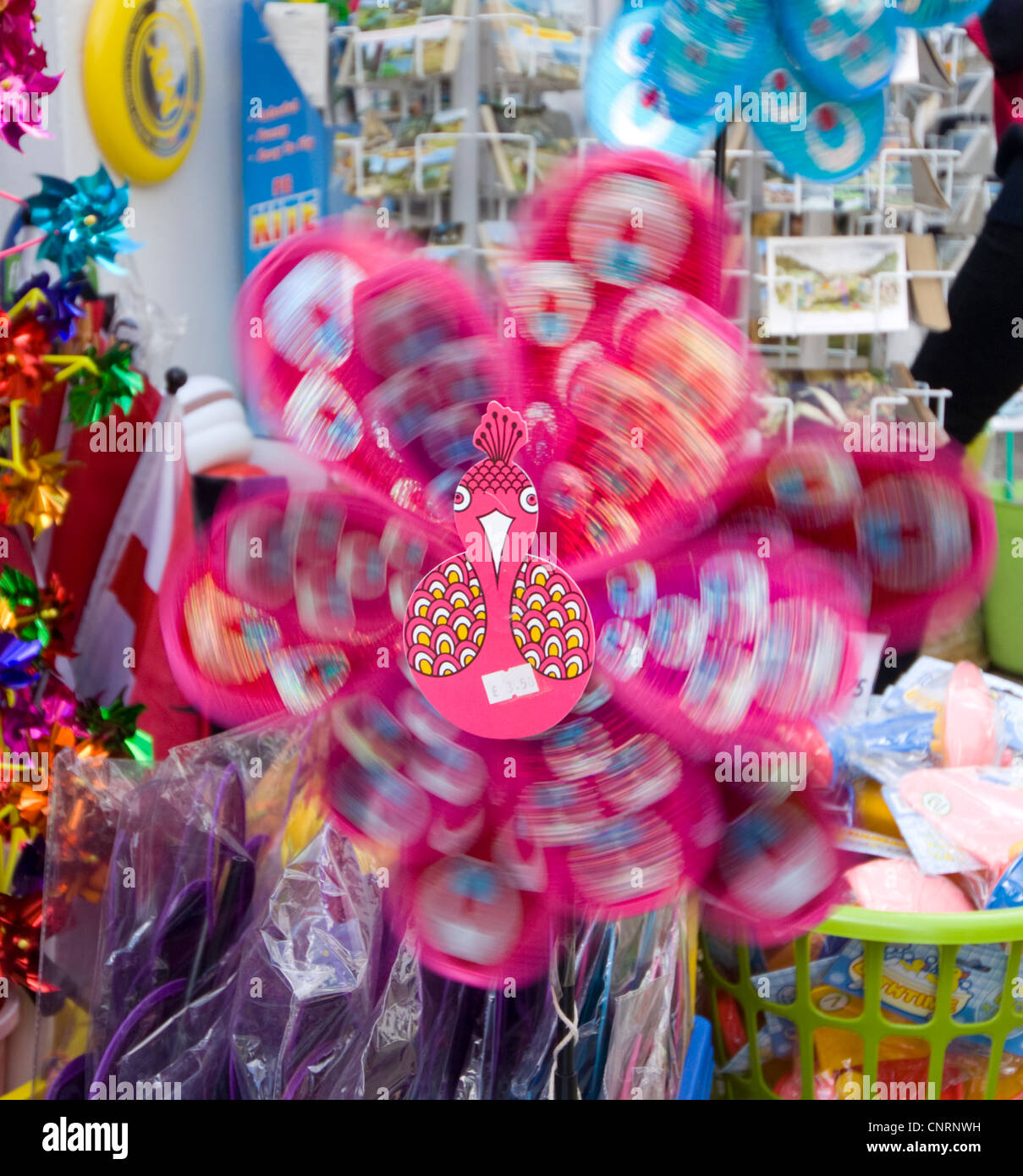 Toy Windmill in a Shop, Quay Street, Lymington, Hampshire, UK Stock Photo