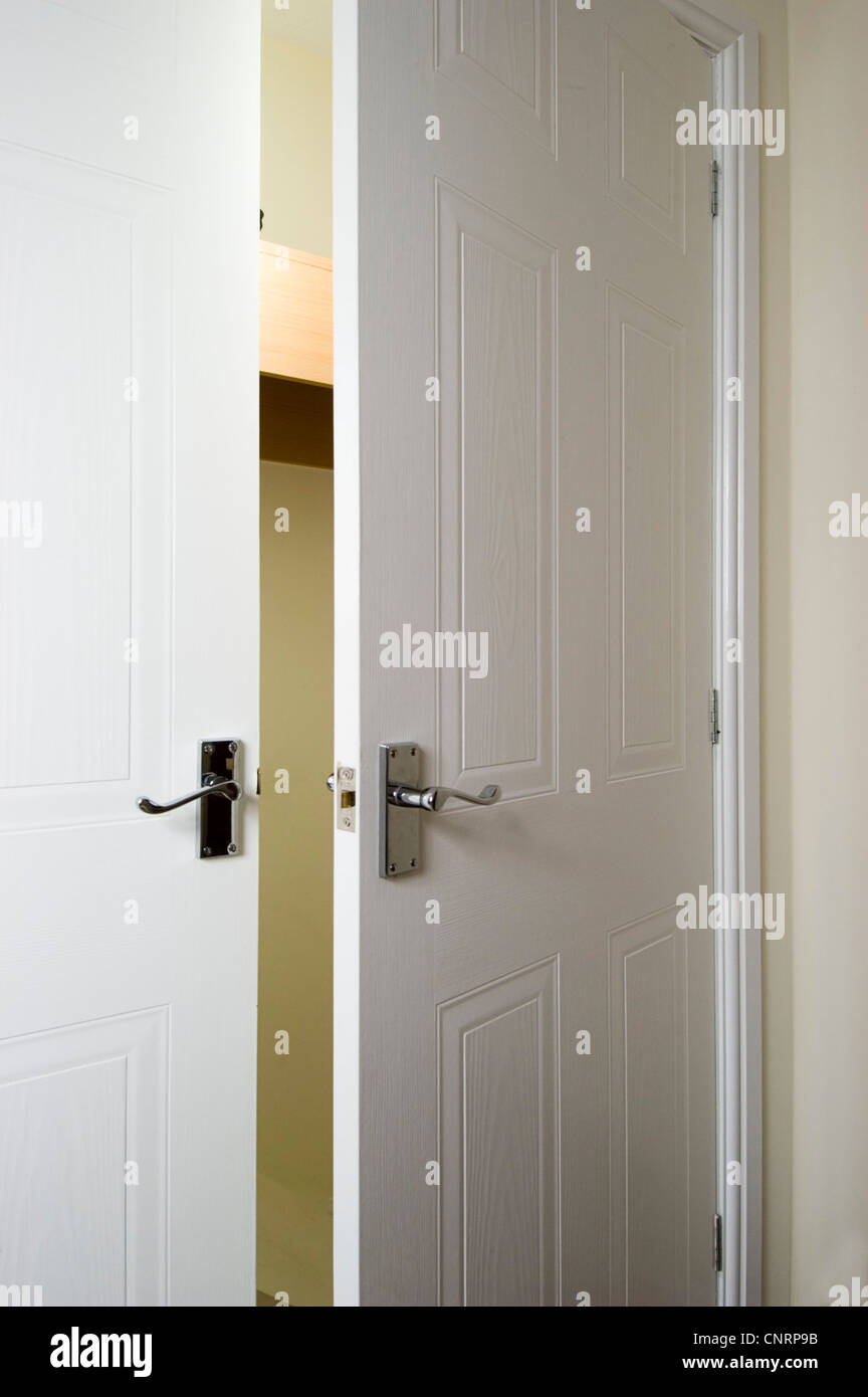 Open doors wardrobe hi-res stock photography and images - Alamy