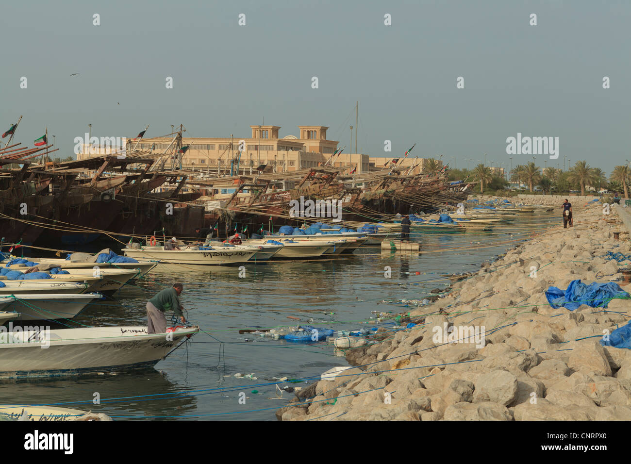 Fishing boats and Dhows in Kuwait City moored up next to the Fish Market Stock Photo Alamy