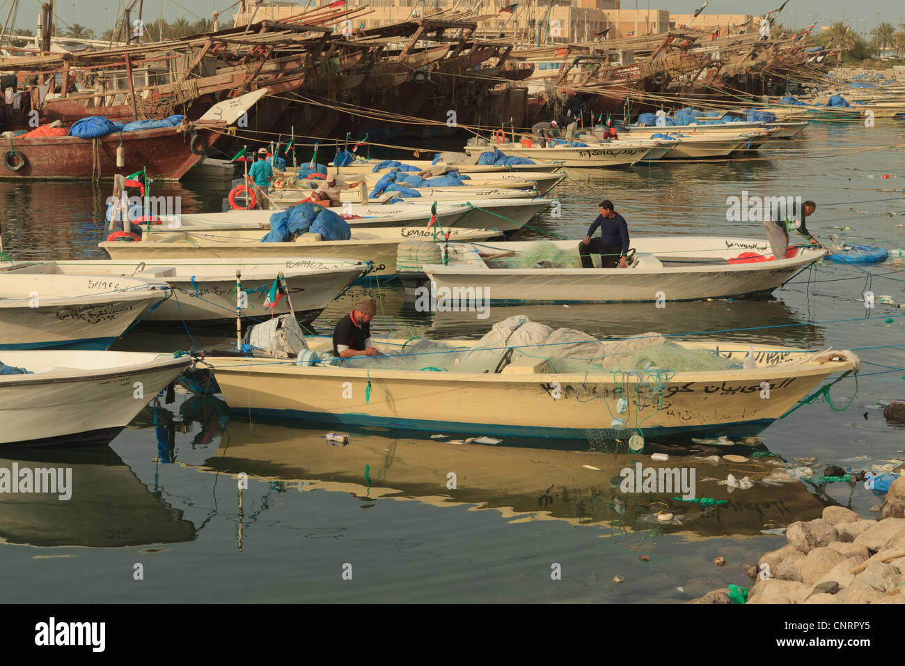 Fishing boats and Dhows in Kuwait City moored up next to the Fish
