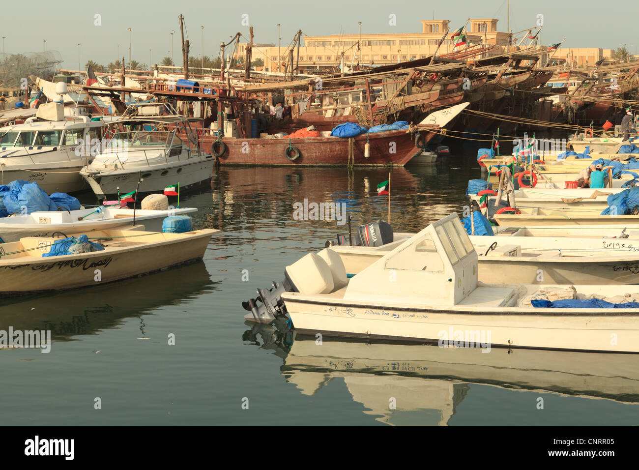 Fishing boats and Dhows in Kuwait City moored up next to the Fish Market Stock Photo Alamy