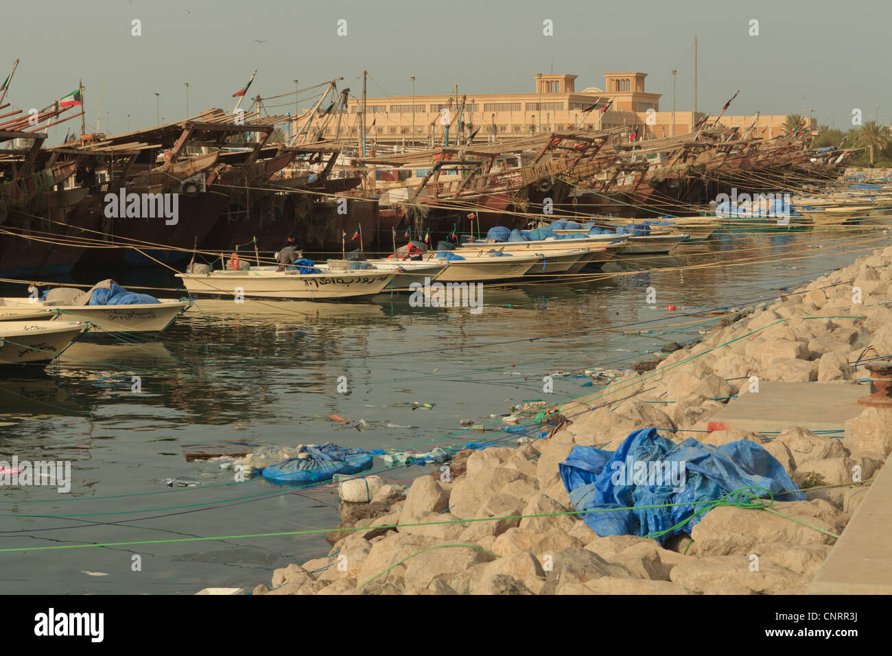 Fishing boats and Dhows in Kuwait City moored up next to the Fish Market Stock Photo Alamy