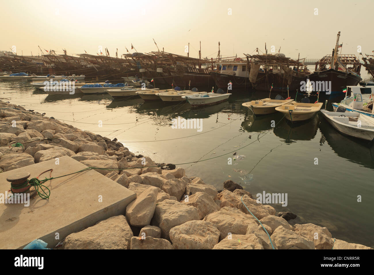Fishing boats and Dhows in Kuwait City moored up next to the Fish