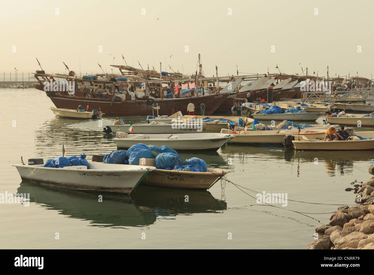 Fishing boats and Dhows in Kuwait City moored up next to the Fish Market Stock Photo Alamy