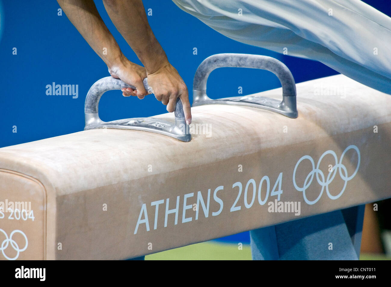 GYMNASTICS Detail of male gymnast competing on the pommel horse in men
