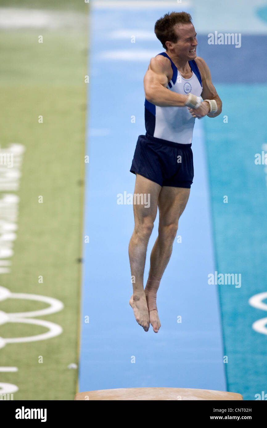 GYMNASTICS Paul Hamm (USA) competing on the vault in men's qualification 2004 Olympic Summer Games, Athens Stock Photo