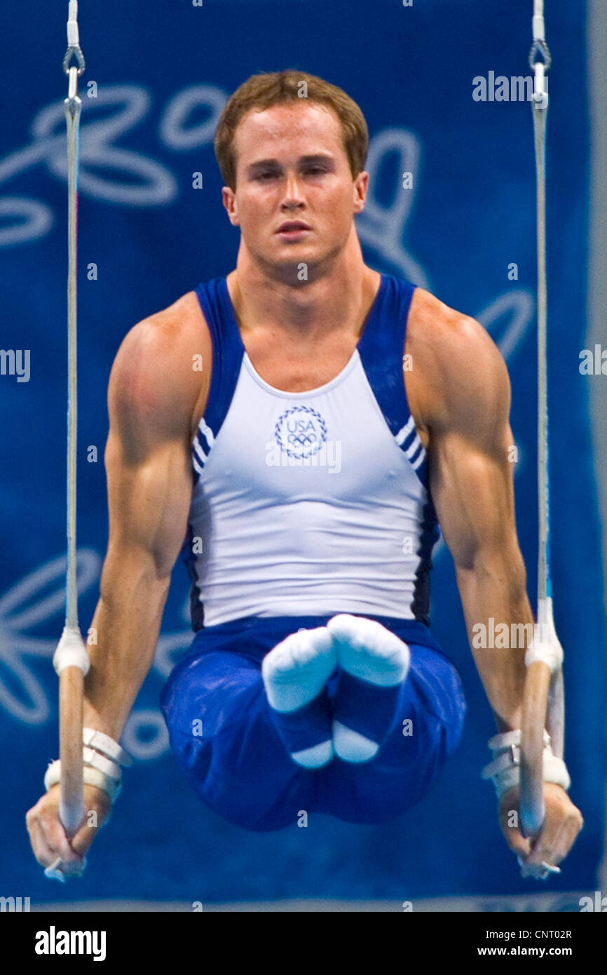 GYMNASTICS Paul Hamm (USA) competing on the rings in men's qualification 2004 Olympic Summer Games, Athens Stock Photo