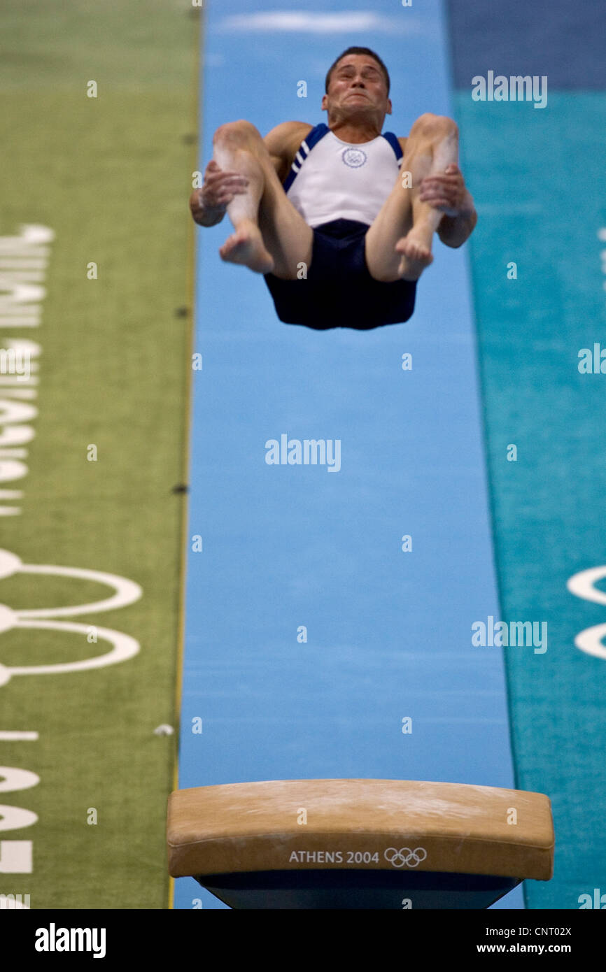 GYMNASTICS Blaine Wilson (USA) competing on the vault in men's qualification 2004 Olympic Summer Games, Athens Stock Photo