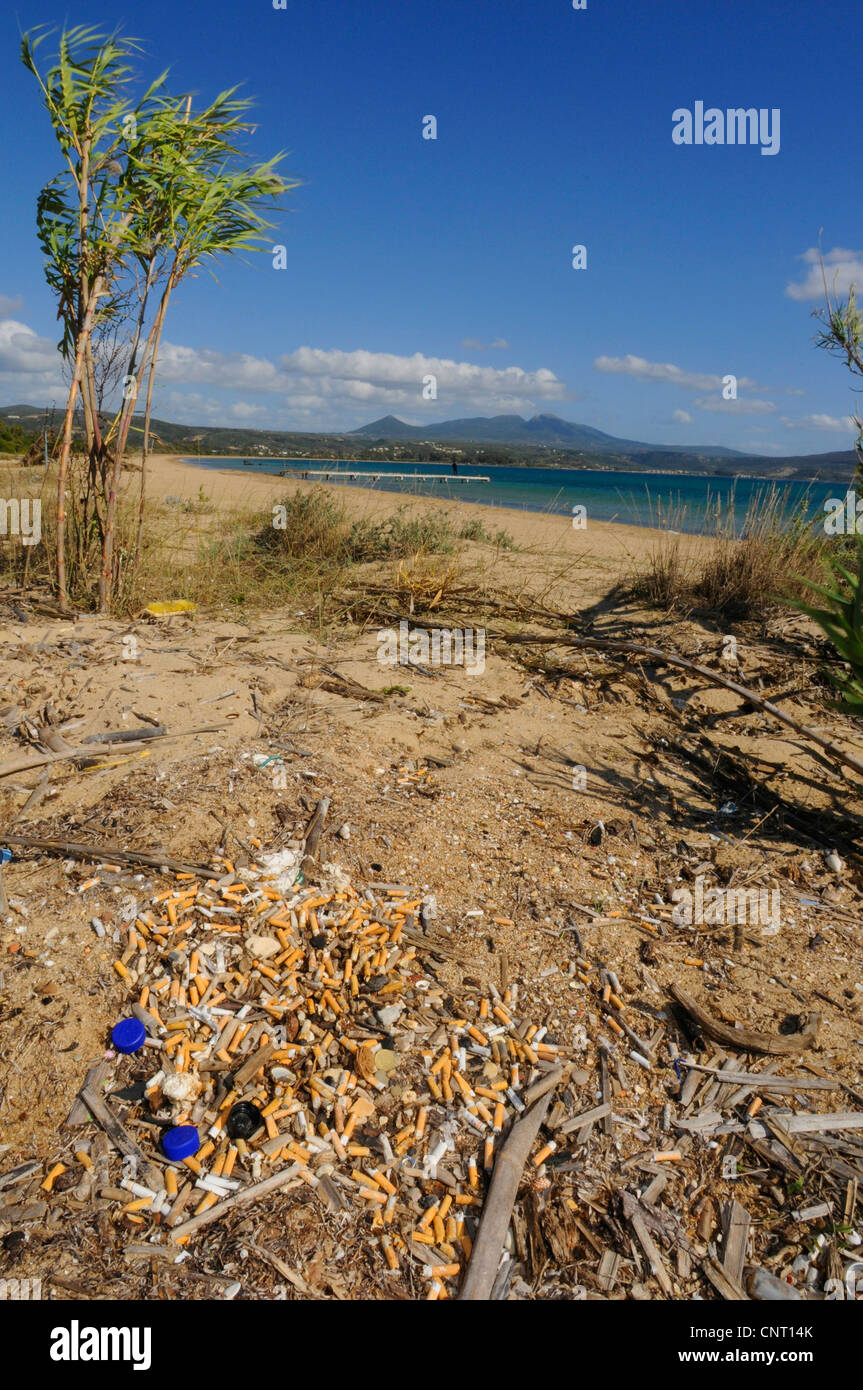 cigarettes from an emptied ash tray on the beach, Greece, Peloponnes, Pylos Stock Photo
