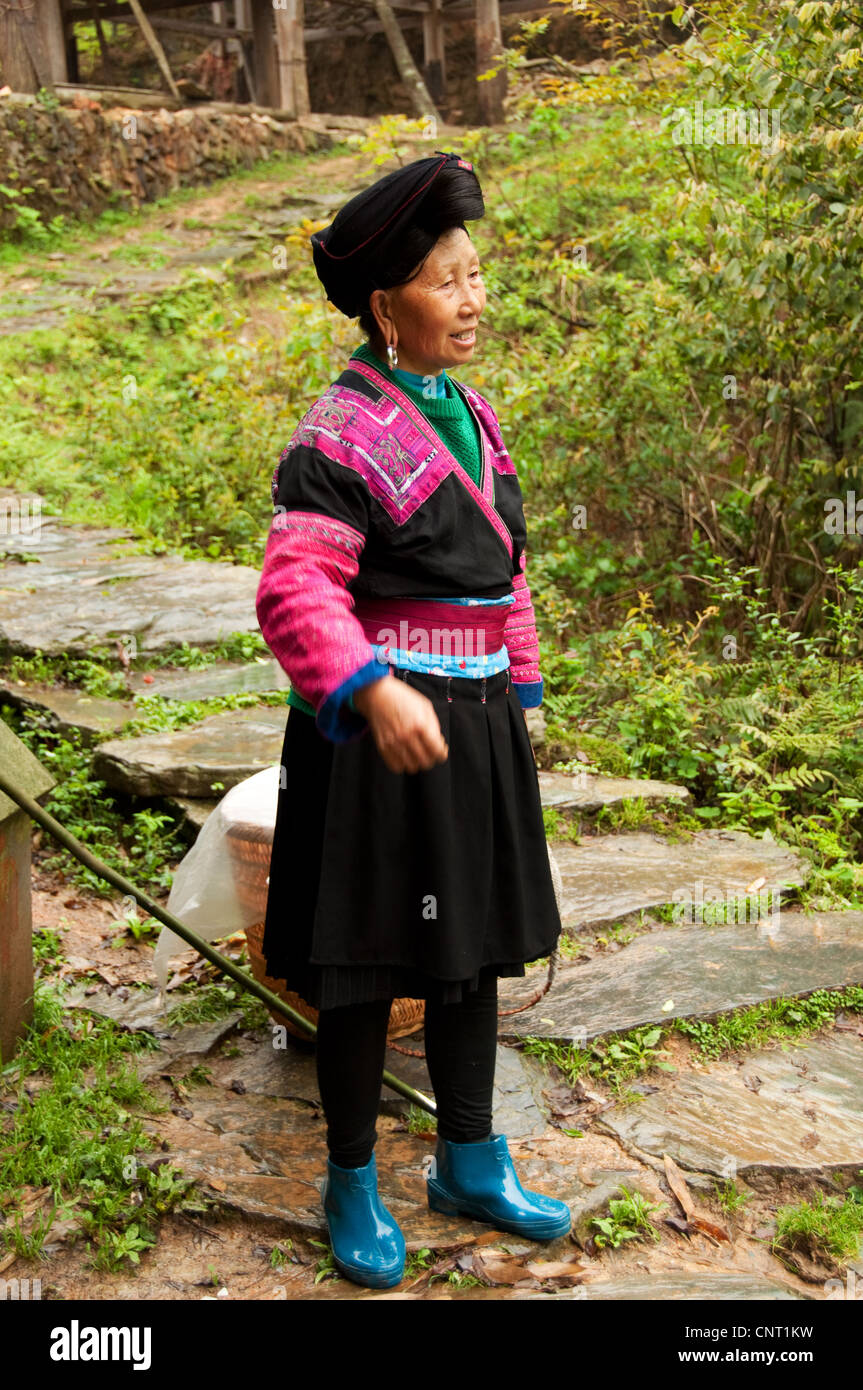 Portrait of an adult Yao woman with traditional hairstyle, Da Zhai village, Guangxi, China Stock Photo