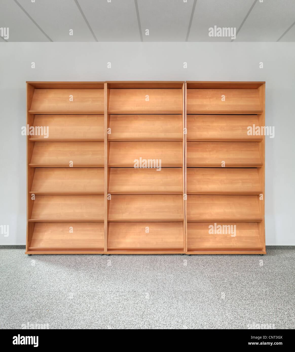 Empty Wooden Bookshelf on the Gray Wall Stock Photo Alamy